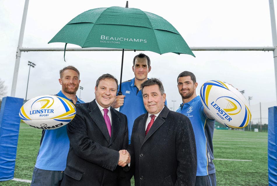 John White, 2nd from left, Managing Partner of Beauchamps Solicitors, and Michael Dawson, 4th from left, CEO of Leinster Rugby, with Leinster Rugby players, from left, Luke Fitzgerald, Devin Toner, and Rob Kearney, at the announcement of Beauchamps as Official Legal Partner of Leinster Rugby
