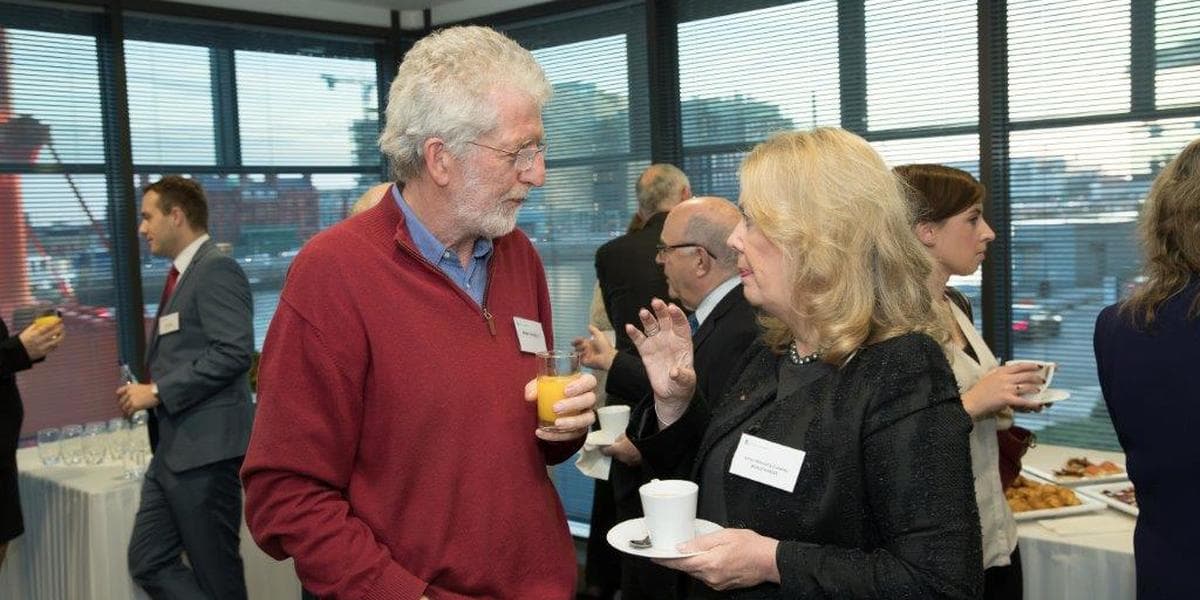 Photo of two people having a discussion at Beauchamps charities event 2017