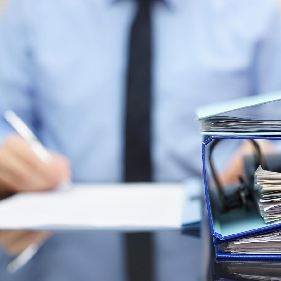 Business man writing large ringbinders2